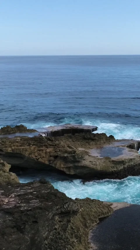 Aerial shot of the shallow reef between Nusa Lembongan and Ceningan Stock-Footage 227791225