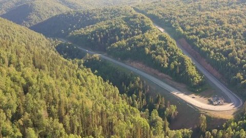 Aerial shot a sharp turn of the road. Stock Footage 112326683