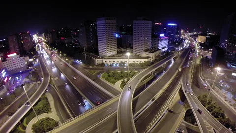 Aerial shot showing a big intersection and highway in Beijing at night Stock Footage 132135743