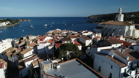 Aerial shot showing the rooftops of Cadaques Stock Footage 137009586