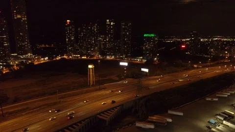 Aerial shot with sideway smooth motion of freeway with cars driving near Stock Footage 116231823
