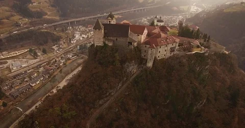 Aerial shot, a small perched town Chiusa in Italy, Sud Tirol, in the mid Stock Footage