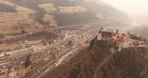 Aerial shot, a small perched town Chiusa in Italy, Sud Tirol, in the middle o Vidéo 77639685
