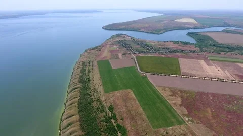 Aerial shot of the splendid Dnipro riverbed with fields and inflow in summer Stock Footage 88204445