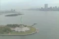 Aerial shot of Statue of Liberty with Twin Towers and Manhattan Footage