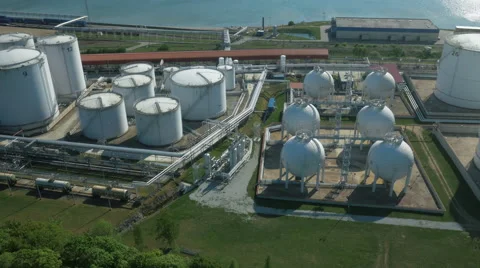 Aerial shot of Storage Silo near Habor. Blue Sea on Background. Stock Footage 64771853