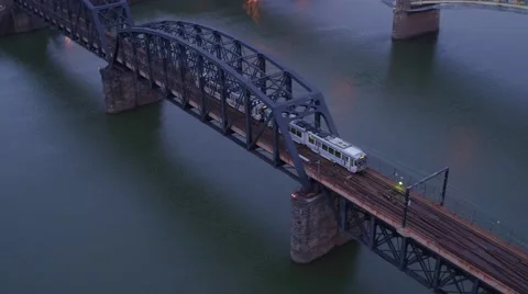 Aerial shot of subway crossing bridge over the Monongahela River in Pittsburgh Stock Footage 59385977