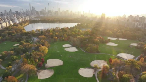 Aerial shot of the sun setting over Central Park Stock Footage 255548607