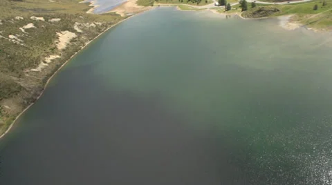 Aerial shot of sun shinning on a stream Stock Footage 34252866