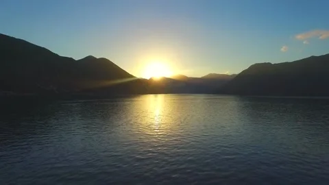 Aerial - Shot Of Sunset Between 2 Mountains Vídeos de archivo 139453839