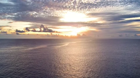 Aerial shot of sunset clouds over the ocean in Hawaii 库存影片 220690824