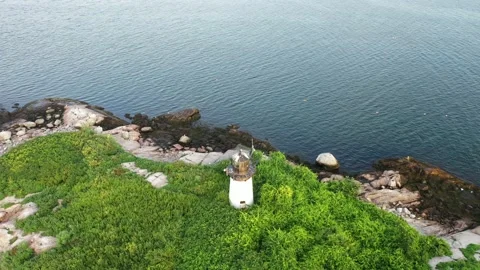 Aerial Shot of Ten Pound Lighthouse at Sunrise in Massachusetts Stock Footage