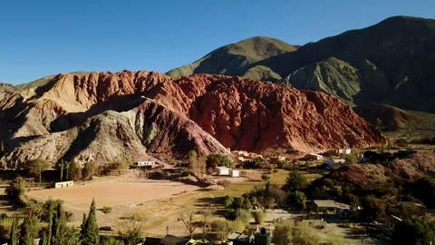 Aerial shot of textures patterns of Seven colored earths HILL GOLDEN HOUR Stock Footage 88395733