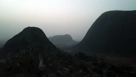 Aerial shot through a dark shadowy valley Stock-Footage 213348985