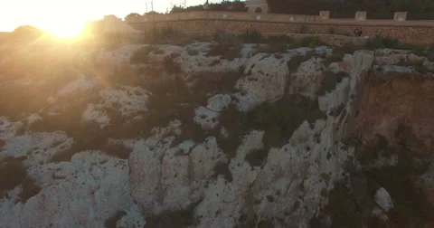 Aerial shot - Tilting down looking at the height of the Cliffs in Zurrieq Stock Footage 61382427