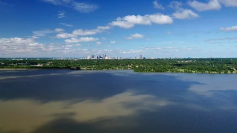 Aerial Shot Tilting to Reveal Downtown Dallas Seen from White Rock Lake Stock Footage