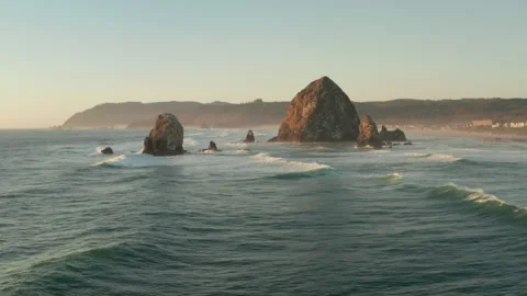 Aerial shot towards haystack rock sea stacks Stock Footage 249989327