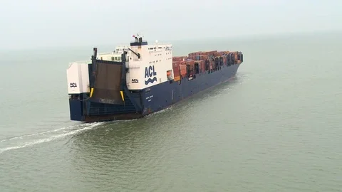 Aerial shot, Tracking In To Container Ship, Irish Sea Stock Footage 98448356