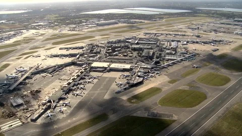 Aerial shot, Tracking Shot Of Heathrow Airport, High & Wide Stock Footage