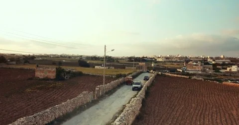 Aerial shot of a tractor in the fields Stock Footage 75168822
