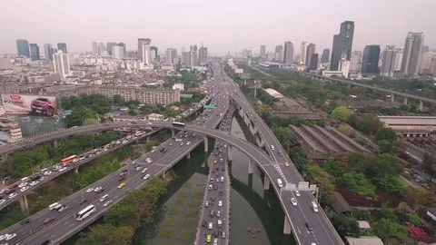 Aerial shot of traffic on elevated road intersection at rush hour Stock Footage 73874040