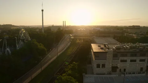Aerial shot of Train Passing through Hershey, Pennsylvania - Sunrise Stock Footage 249692947