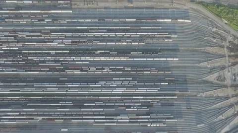 Aerial shot train track camera looking down during sunrise Stock Footage 61114398