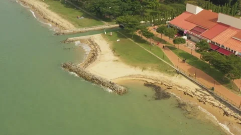 Aerial shot of trash &amp; garbage on beach ,East Coast Park, Singapore Stock Footage 137280557