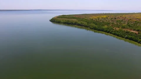 Aerial shot of a triangular islet in the Dnipro basin on a sunny day in summer Stock Footage 88203594