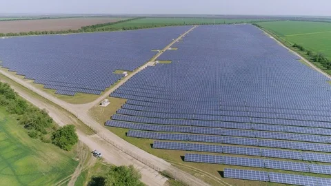 Aerial shot of triangular solar electricity station in Odessa region in summer Stock Footage 99325949
