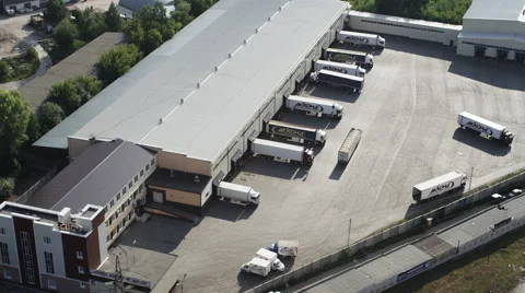 Aerial shot trucks at loading UHD 4K Vidéo 46213100