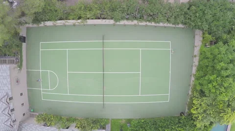 Aerial Shot of Two People Playing Tennis Stock Footage 61841027