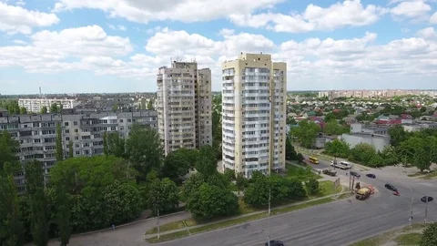 Aerial shot of two residential skyscrappers with impressive cloudscape Stock Footage