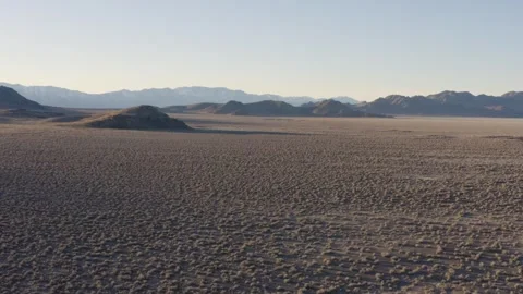 Aerial shot of a vast empty plain with hills, Salt Lake City, US Vídeos de archivo 287724835