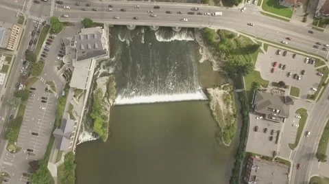 Aerial shot vertical look down river running across a city in a sunny day 1 Stock Footage 61135724