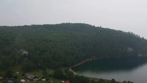 Aerial shot. The view from the drone on a train with that travels on the Stock Footage 123793996