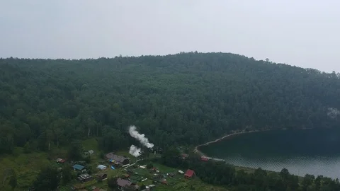 Aerial shot. The view from the drone on a train that travels on the Stock Footage 124231831
