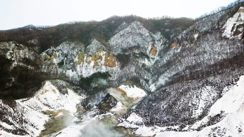 Aerial shot of volcanic crater , Hell Valley , Noboribetsu, Hokkaido, Japan Stock Footage 108781101