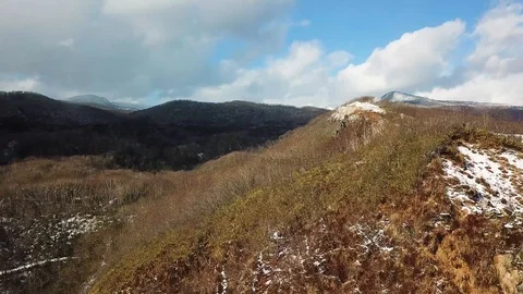 Aerial shot of volcanic crater , Hell Valley , Noboribetsu, Hokkaido, Japan Stock Footage 108781133