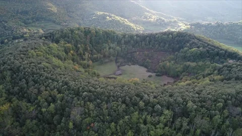 Aerial shot of a volcano in Fall.  Volcà de Santa margarida, Garrotxa Stock Footage 140290036
