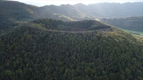 Aerial shot of a volcano in Fall.  Volcà de Santa margarida, Garrotxa Stock Footage 140290101