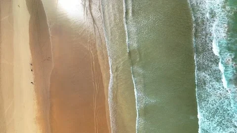 Aerial Shot of Waves Calmly Rolling onto the Beach, Perranporth, Cornwall. Stock Footage 310135600