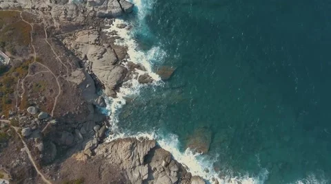 Aerial shot of Waves crashing on rocks, Corsica Island Stock Footage