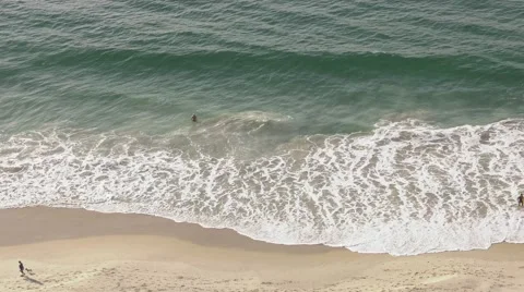 Aerial Shot of Waves Lapping Copacabana Beach in Rio de Janeiro Stock Footage 64978628