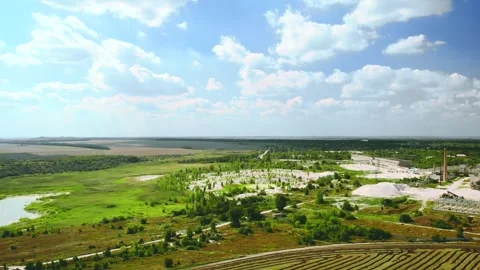 Aerial shot of a white clay processing plant of kaolin ore. Beautiful steppe Stock Footage 313201376