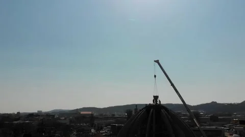 Aerial shot of workers in a construction, structure in the process to be build Stock Footage 142884982