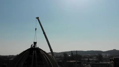 Aerial shot of workers in a construction, structure in the process to be build Stock Footage 142896727