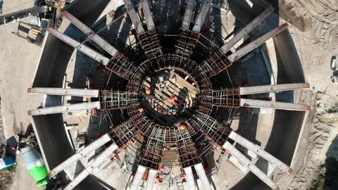 Aerial shot of workers in a construction, structure in the process to be build Video stock 142898842