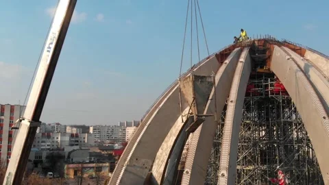 Aerial shot of workers in a construction, structure in the process to be build Video stock 142899146
