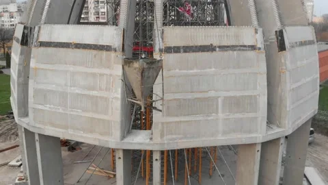 Aerial shot of workers in a construction, structure in the process to be build Stock Footage 142899209